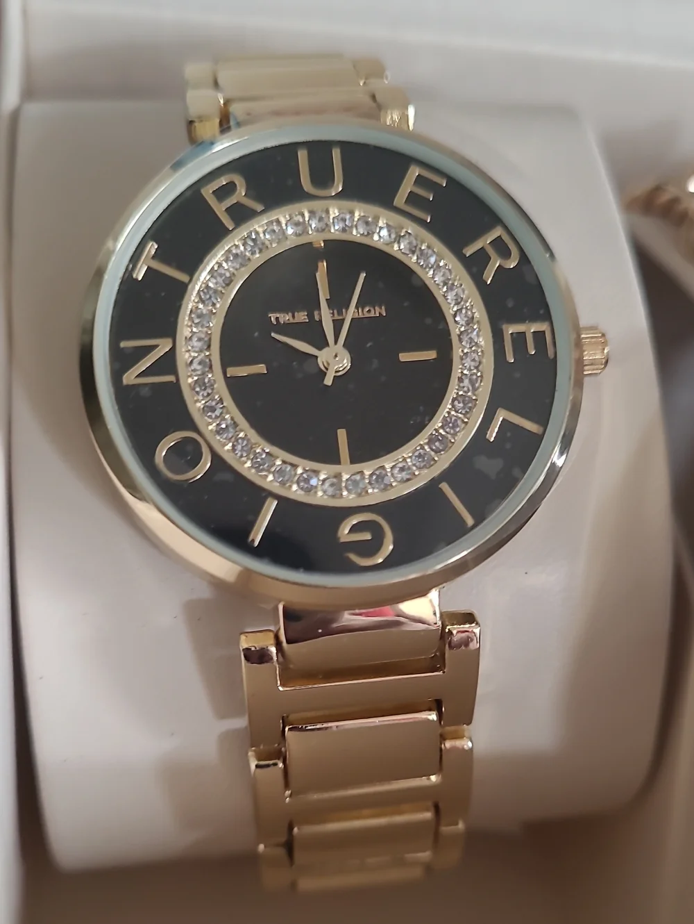 True Religion Gold-Tone Watch with Black Dial and Charm Bracelet